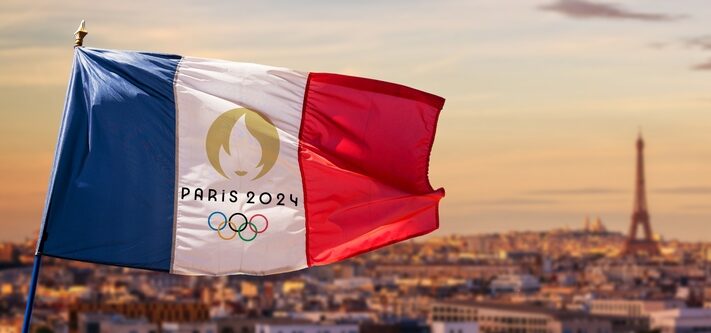 French flag with Paris 2024 summer olympic games logo, Eiffel tower on May 23, 2017 in Paris France